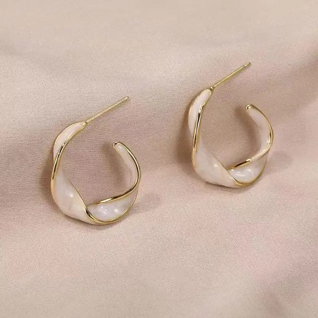Twisted white crystal hoop earrings
