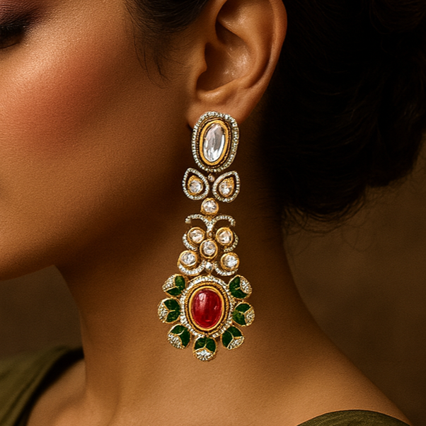 Woman wearing a pair of ornate earrings with a brown background
