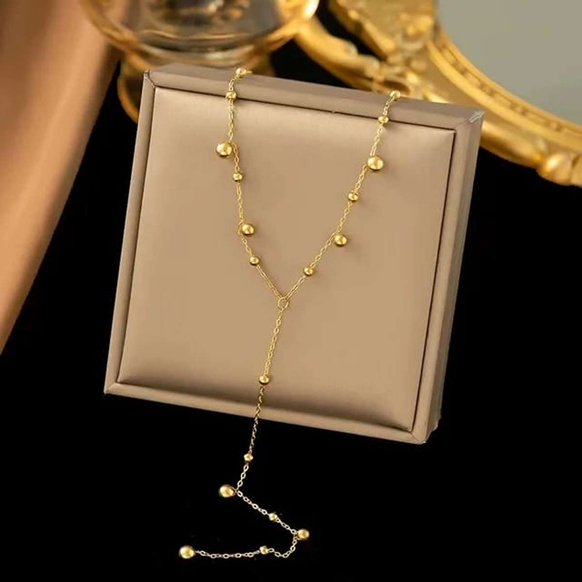 Golden long ball Pendent