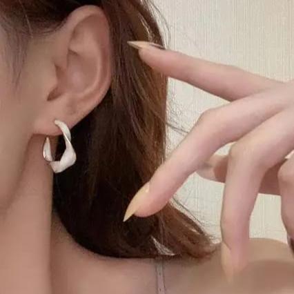 Twisted white crystal hoop earrings