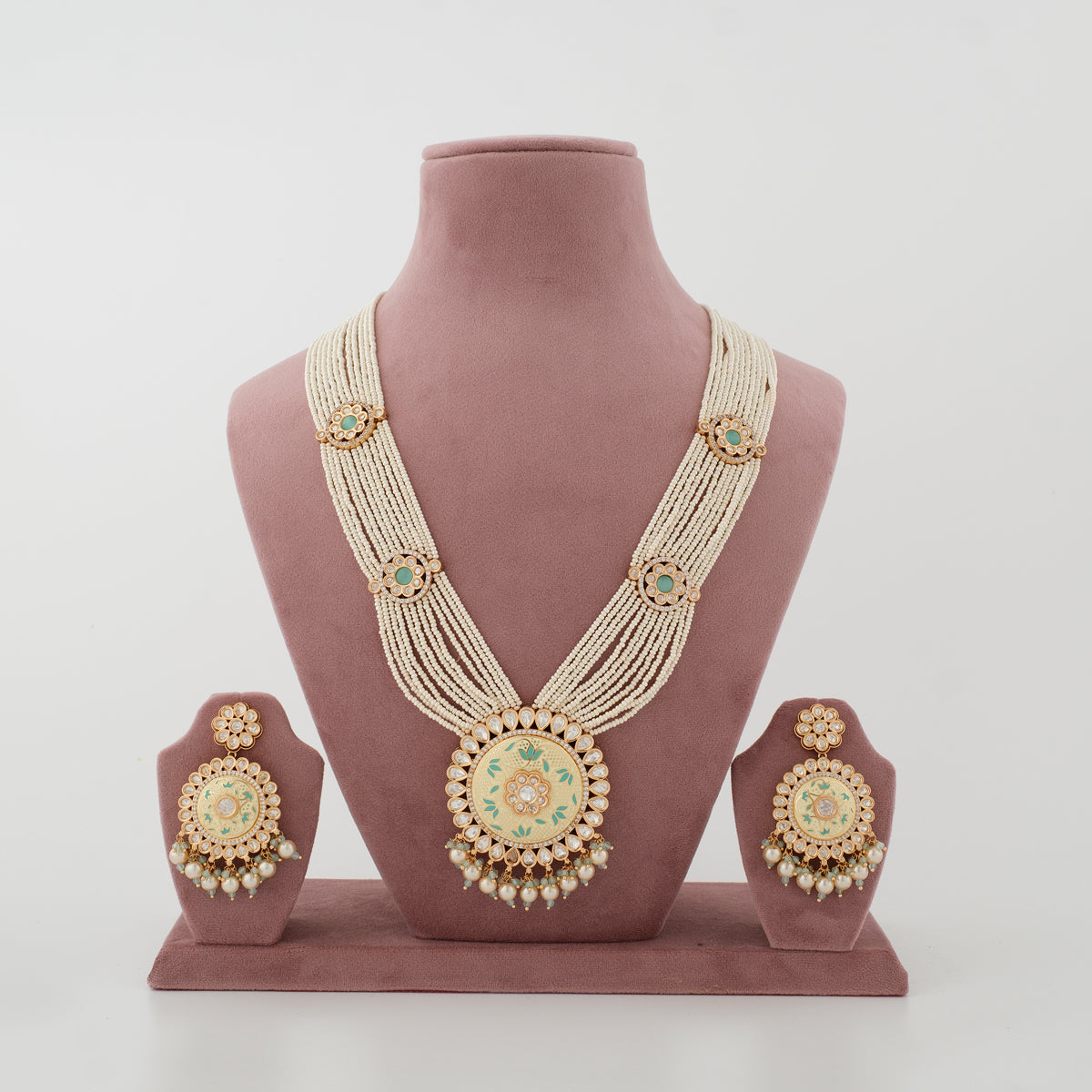 Meher Mint Rani Haar artificial jewellery set with ivory bead strands and matching earrings