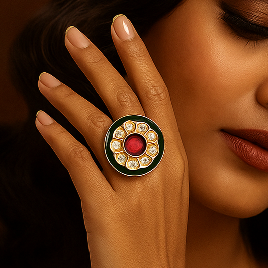 Woman wearing a ring with a prominent gemstone against a warm brown background