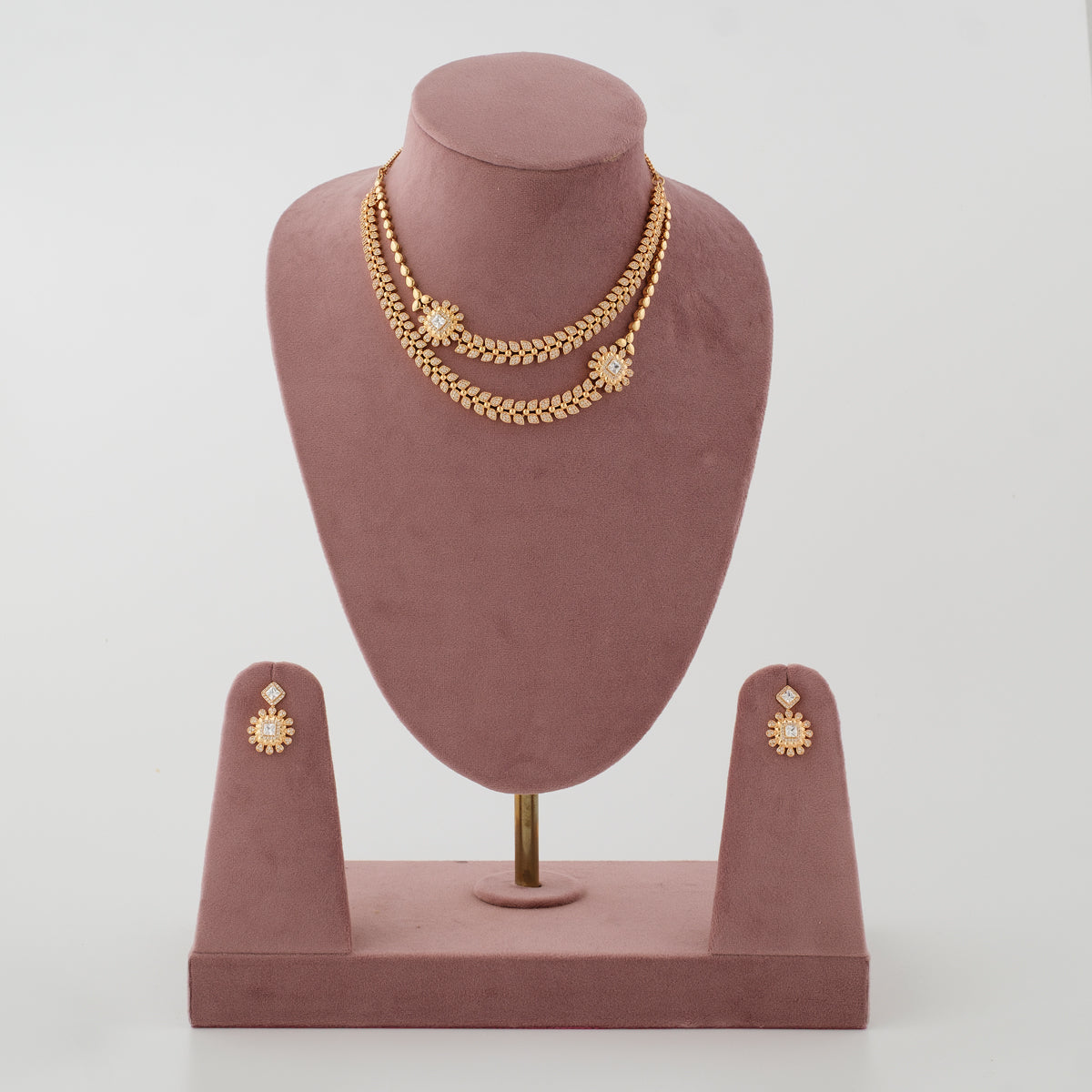 Aarvika Diamond Layer Necklace Set with gold tone finish