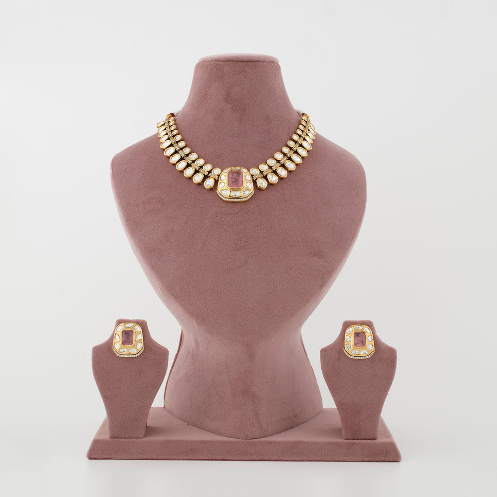 Aavira gold-tone artificial necklace set with blush-pink centre stone and matching earrings
