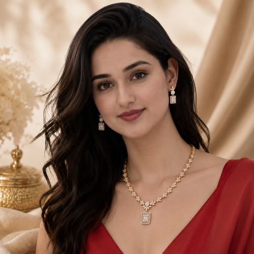 Aurelia diamond-look necklace and rectangular drop earrings worn with a red outfit