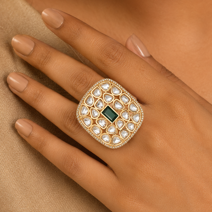 Woman wearing an oversized gold-finish Kundan-look statement ring