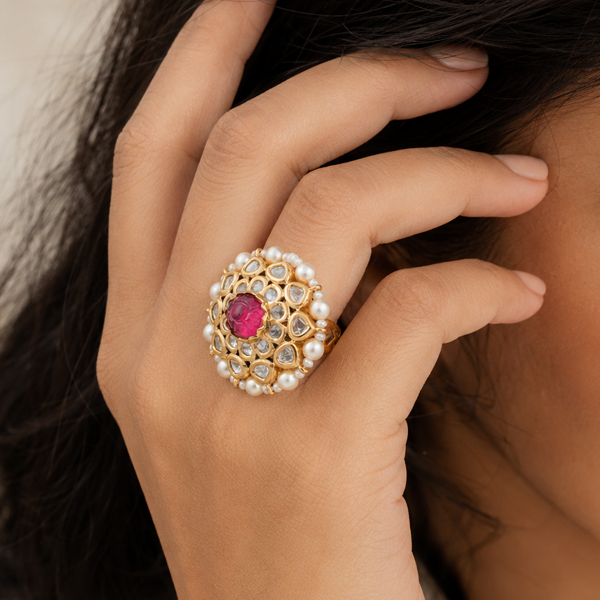 Woman wearing the Gulnaar pink floral cocktail ring with a traditional outfit