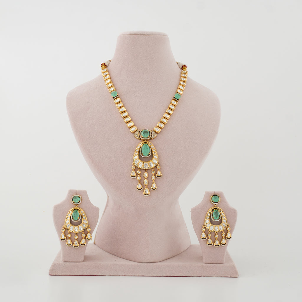 Haritima gold-plated artificial Kundan necklace set with mint-green stones and matching earrings