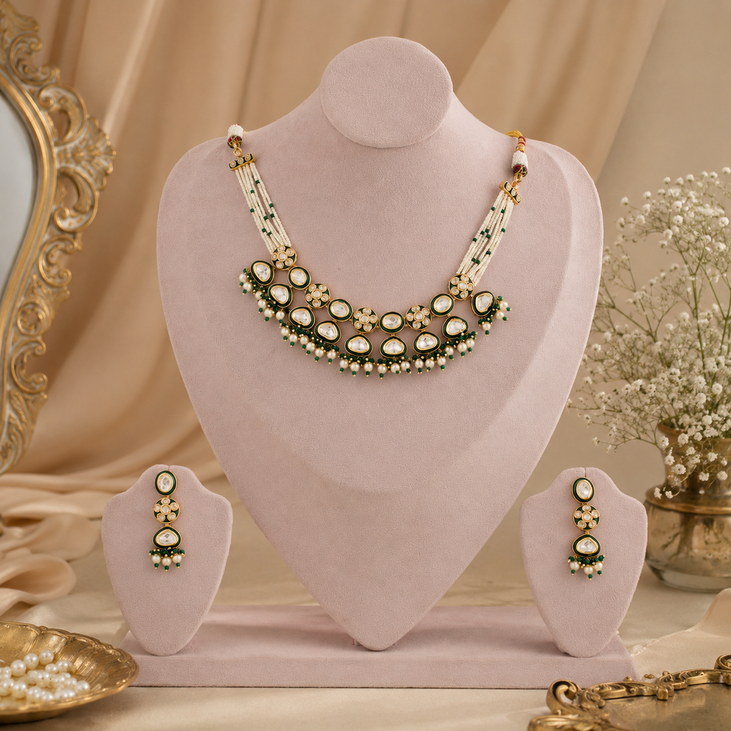Traditional green and white Kundan moti necklace set displayed with matching earrings
