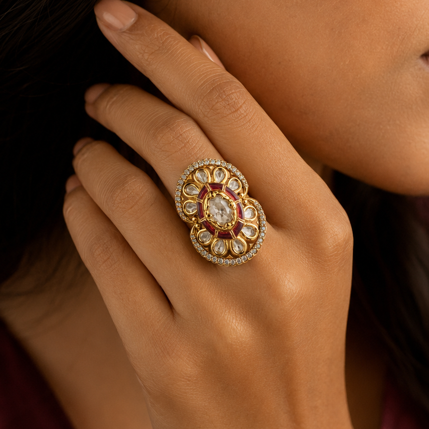 Woman wearing the Ishita ruby-red enamel Kundan-look statement ring