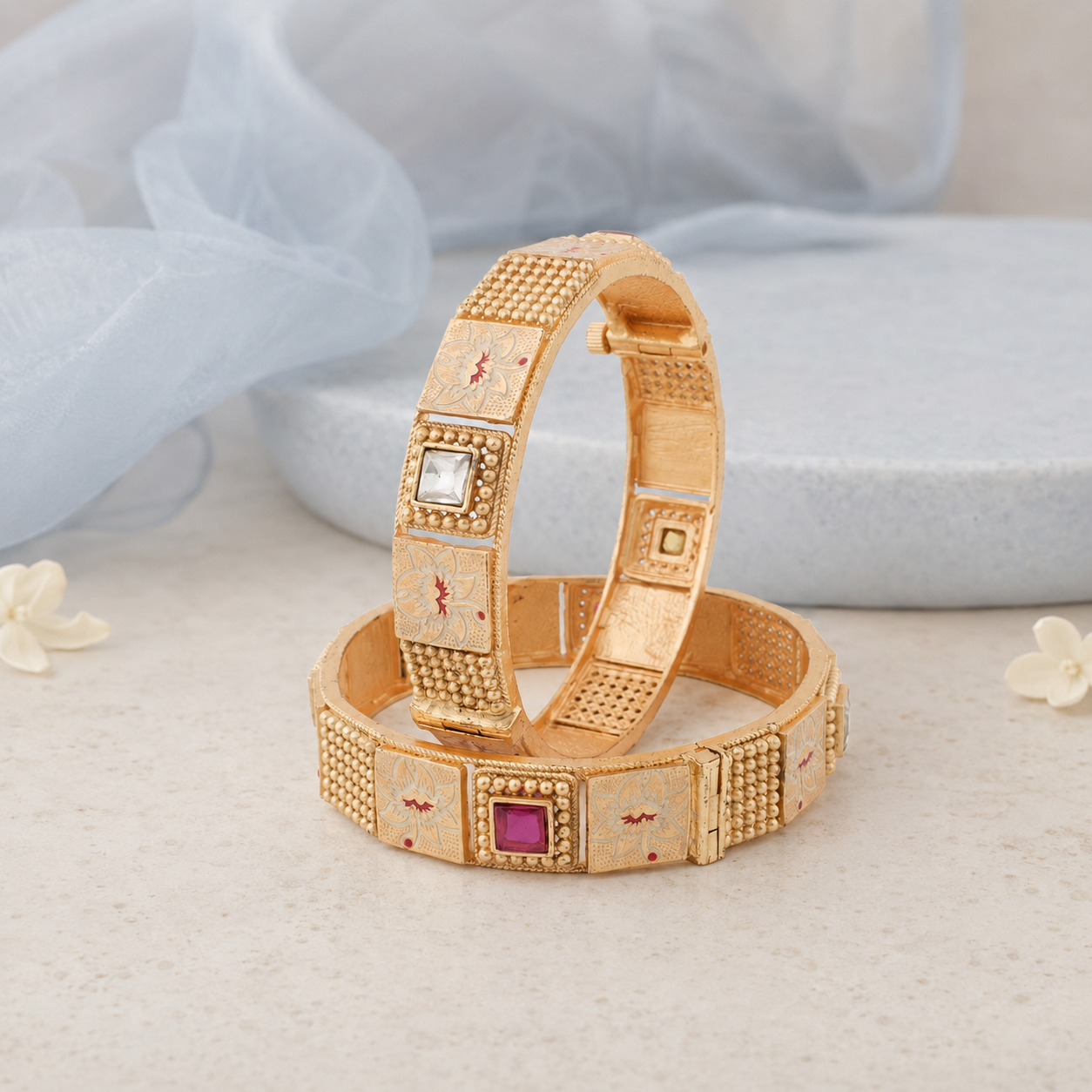 Gold-finish floral Meenakari kada bangles upright view