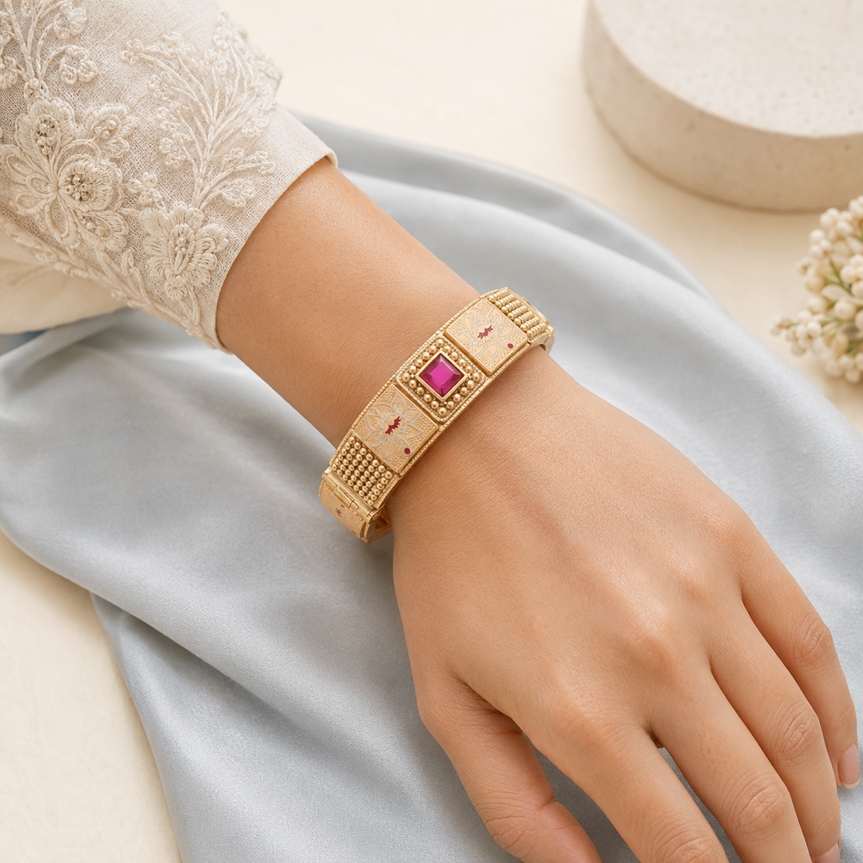 Woman wearing Kashvi ruby-centre floral Meenakari kada bangle