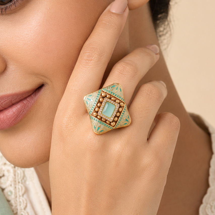 Woman wearing the Kashvi mint-green geometric statement ring