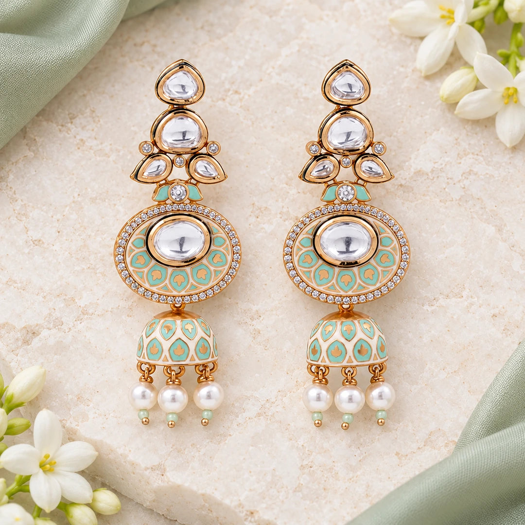 Pair of Kritara ivory and mint jhumka earrings