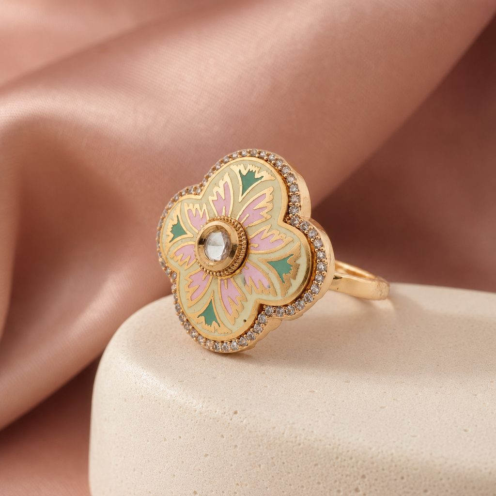 Pastel floral statement ring displayed on a neutral pedestal