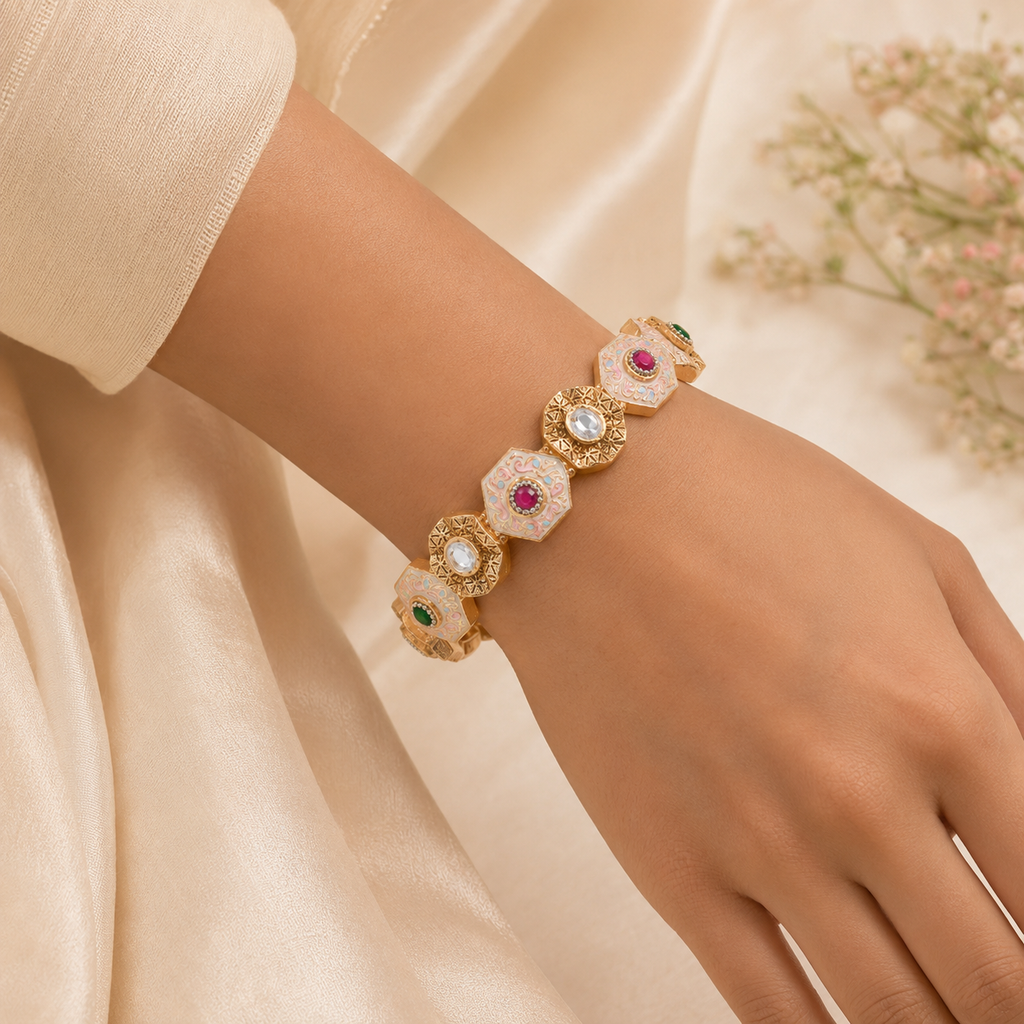 Woman wearing Navya gold meenakari imitation bangle by Zoi Craft