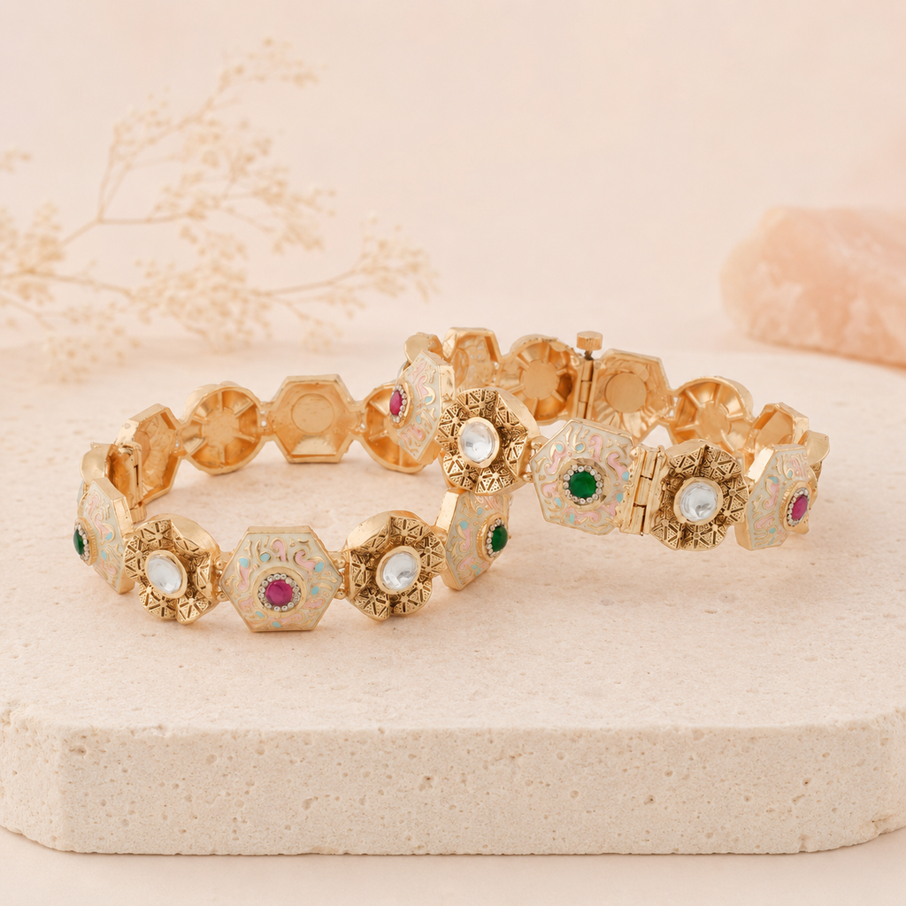 Navya gold-finish pastel meenakari statement bangle pair by Zoi Craft