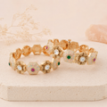 Navya gold-finish pastel meenakari statement bangle pair by Zoi Craft