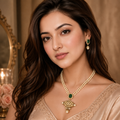 Model wearing Nayab emerald-green artificial necklace set with matching earrings