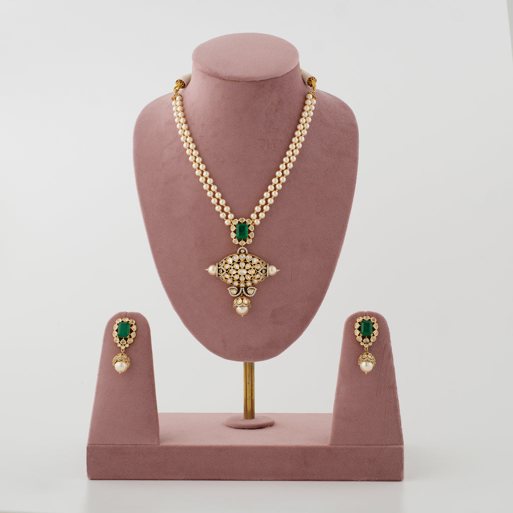 Nayab green artificial necklace set with pearl-look strands and matching earrings