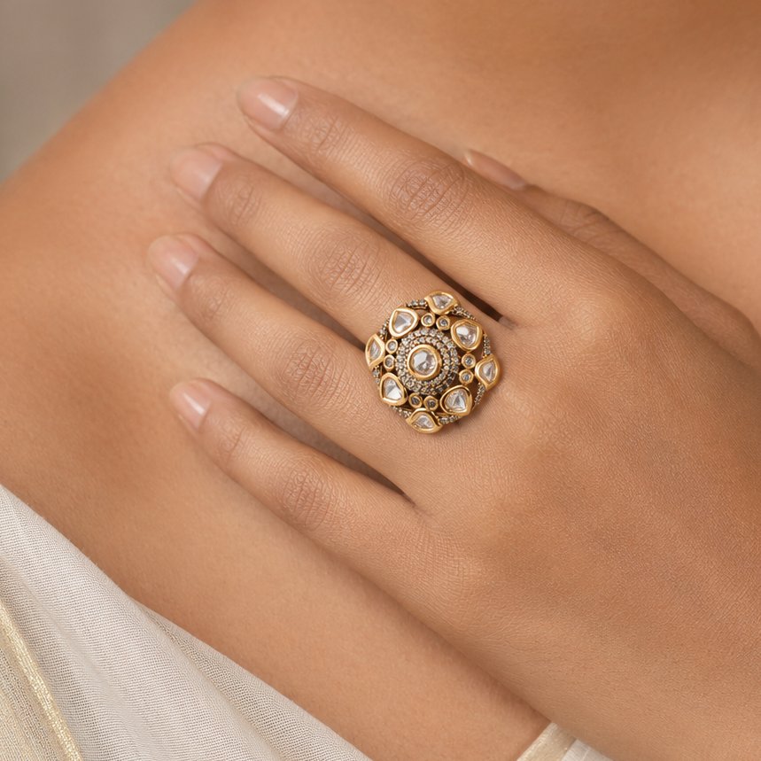 Woman wearing the Nayra gold-finish Kundan-look statement ring