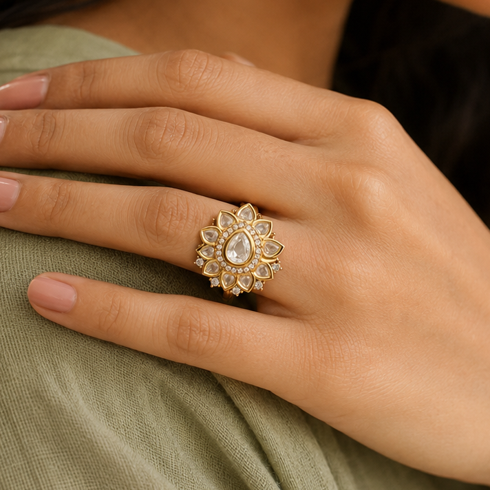 Gold-finish floral ring styled with an elegant ethnic outfit
