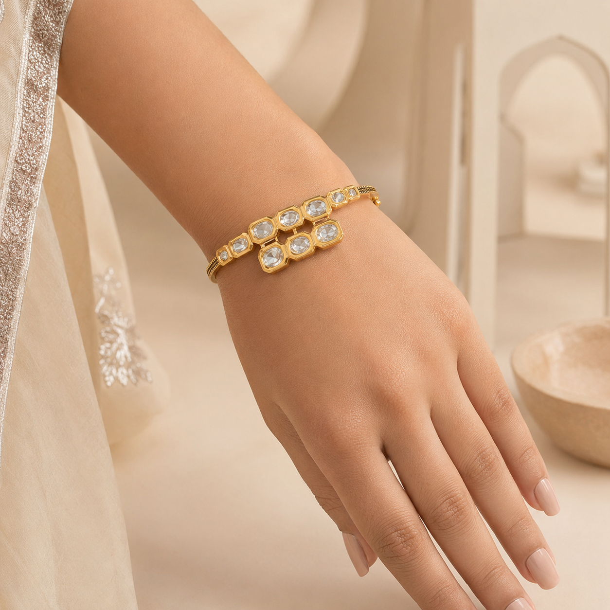 Woman wearing the Vihana gold Polki cascade bracelet naturally on her wrist